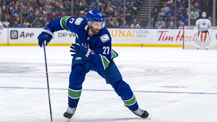 Oct 4, 2024; Vancouver, British Columbia, CAN; Vancouver Canucks defenseman Derek Forbort (27) skates against the Edmonton Oilers during the second period at Rogers Arena. Mandatory Credit: Bob Frid-Imagn Images