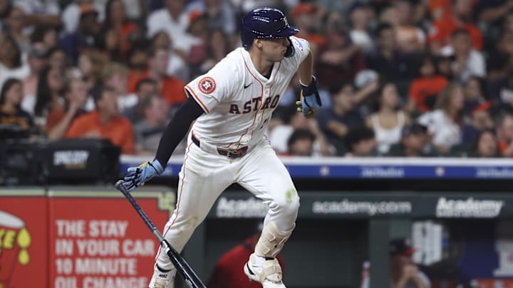 Jul 29, 2025; Houston, Texas, USA; Houston Astros second baseman Shay Whitcomb (10) hits an infield single during the sixth i