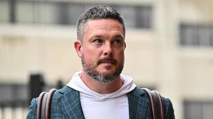 Nov 8, 2025; Iowa City, Iowa, USA; Oregon Ducks head coach Dan Lanning enters Kinnick Stadium before the game against the Iowa Hawkeyes. 