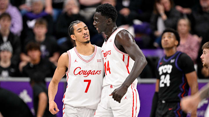 Jan 28, 2026; Fort Worth, Texas, USA; Houston Cougars guard Milos Uzan (7) and forward Kalifa Sakho (14) celebrates during the first half against the TCU Horned Frogs at Ed and Rae Schollmaier Arena. 