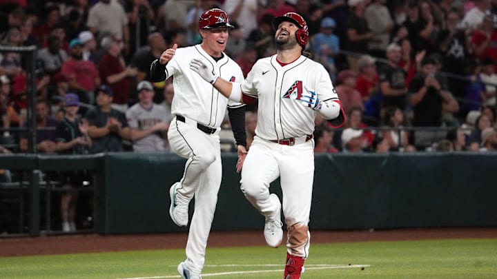 Jul 19, 2025; Phoenix, Arizona, USA; Arizona Diamondbacks third base Eugenio Suarez (28) celebrates with third base coach Shaun Larkin (88) after hitting a solo home run against the St. Louis Cardinals in the third inning at Chase Field. Mandatory Credit: Rick Scuteri-Imagn Images Jul 19, 2025; Phoenix, Arizona, USA; Arizona Diamondbacks third base Eugenio Suarez (28) celebrates with third base coach Shaun Larkin (88) after hitting a solo home run against the St. Louis Cardinals in the third inning at Chase Field. Mandatory Credit: Rick Scuteri-Imagn Images