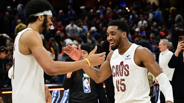 Jan 8, 2025; Cleveland, Ohio, USA; Cleveland Cavaliers guard Donovan Mitchell (45) celebrates with center Jarrett Allen (31) after the Cavaliers beat the Oklahoma City Thunder at Rocket Mortgage FieldHouse. Mandatory Credit: Ken Blaze-Imagn Images
