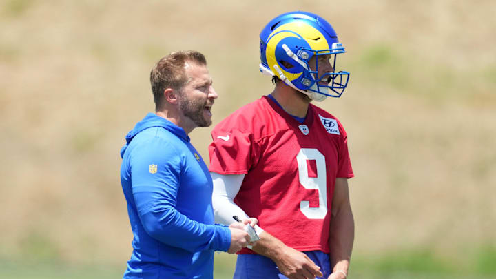 May 21, 2024, Thousand Oaks, California, USA; Los Angeles Rams coach Sean McVay (left) talks with quarterback Matthew Stafford (9) during organized team activities at Cal Lutheran University. Mandatory Credit: Kirby Lee-USA TODAY Sports