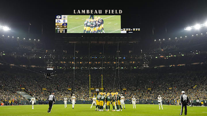 The Green Bay Packers huddle up during their game against the Saints.