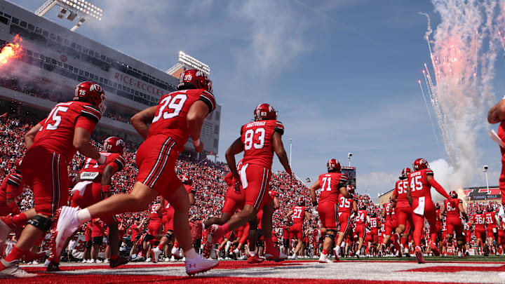 The Utah Utes run out on the field before the game against the Baylor Bears at Rice-Eccles Stadium. The Utah Utes run out on the field before the game against the Baylor Bears at Rice-Eccles Stadium.