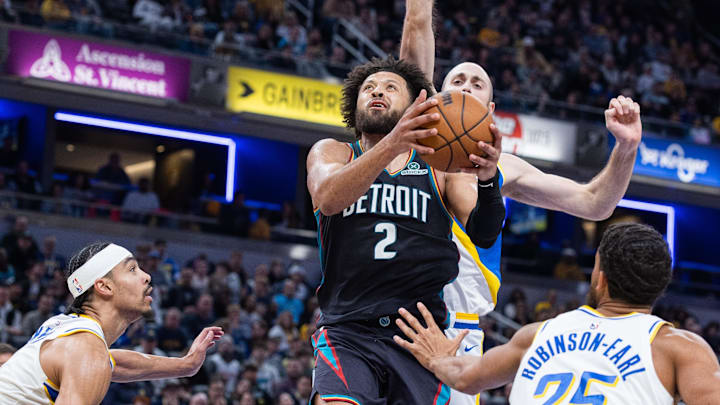 Nov 24, 2025; Indianapolis, Indiana, USA; Detroit Pistons guard Cade Cunningham (2) shoots the ball while Indiana Pacers center Jay Huff (32) defends in the second half at Gainbridge Fieldhouse. Mandatory Credit: Trevor Ruszkowski-Imagn Images