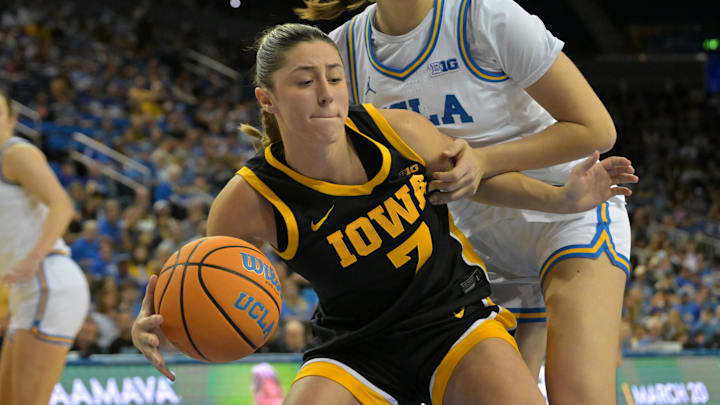 Feb 1, 2026; Los Angeles, California, USA;  Iowa Hawkeyes guard Addie Deal (7) is defended by UCLA Bruins guard Lena Bilic (9) in the second half at Pauley Pavilion presented by Wescom Financial. Mandatory Credit: Jayne Kamin-Oncea-Imagn Images