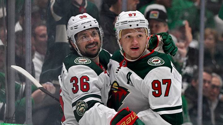 Apr 28, 2026; Dallas, Texas, USA; Minnesota Wild right wing Mats Zuccarello (36) and left wing Kirill Kaprizov (97) celebrates a goal scored by Zuccarello against the Dallas Stars in game five of the first round of the 2026 Stanley Cup Playoffs at American Airlines Center. Mandatory Credit: Jerome Miron-Imagn Images