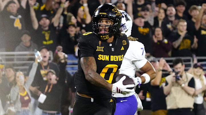 Arizona State wide receiver Jordyn Tyson (0) catches a pass against TCU defensive back Channing Canada (7) on his way to a touchdown during a game at Mountain America Stadium in Tempe, Ariz. on Sept. 26, 2025.