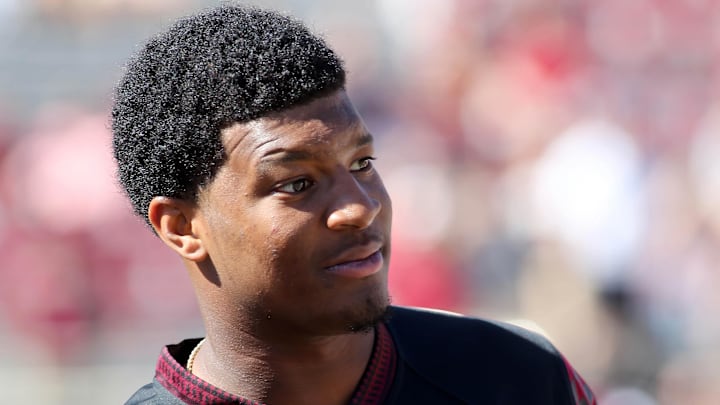 Oct 17, 2015; Tallahassee, FL, USA; Tampa Bay Buccaneers quarterback and former FSU quarterback Jameis Winston watches pregame warmups as the Florida State Seminoles host the Louisville Cardinals at Doak Campbell Stadium.  Mandatory Credit: Glenn Beil-Imagn Images
