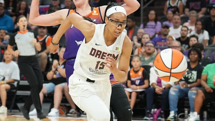 Atlanta Dream guard Allisha Gray (15) chases the ball.
