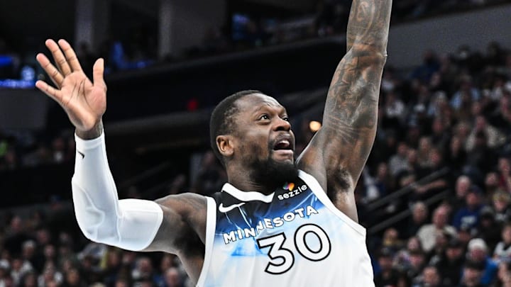 Jan 25, 2025; Minneapolis, Minnesota, USA; Minnesota Timberwolves forward Julius Randle (30) shoots the ball against the Denver Nuggets during the fourth quarter at Target Center. Mandatory Credit: Jeffrey Becker-Imagn Images