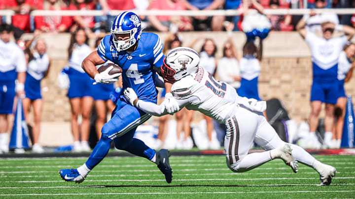 BYU RB LJ Martin runs the football against Texas Tech