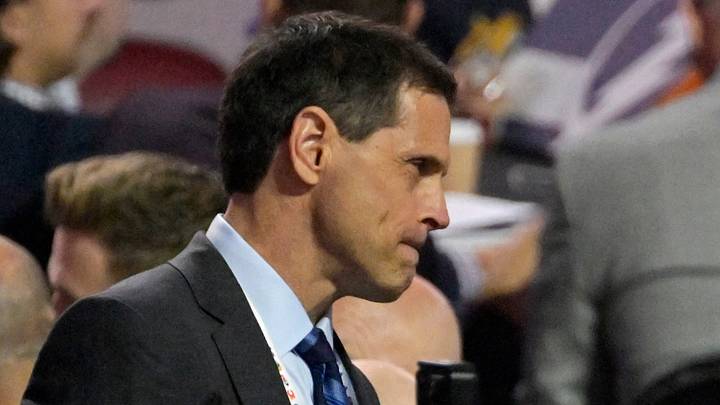 Jul 8, 2022; Montreal, Quebec, CANADA; Boston Bruins general manager Don Sweeney (left) and president Cam Neely discuss during the second round of the 2022 NHL Draft at the Bell Centre. Mandatory Credit: Eric Bolte-USA TODAY Sports