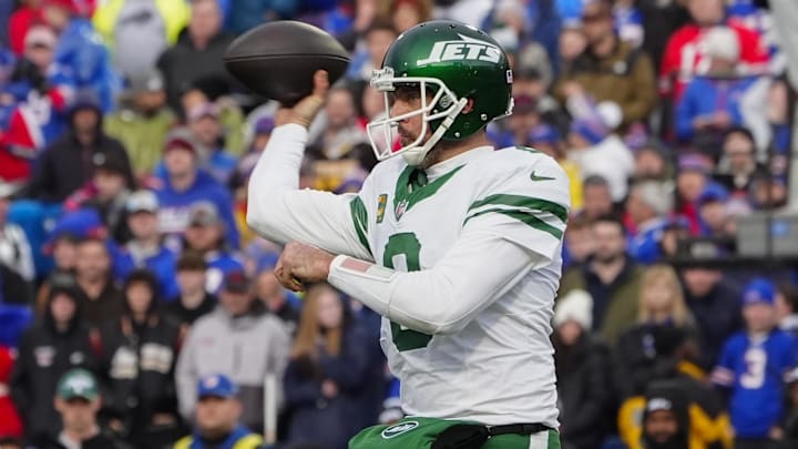 Dec 29, 2024; Orchard Park, New York, USA; New York Jets quarterback Aaron Rodgers (8) throws the ball against the Buffalo Bills during the second half at Highmark Stadium. 