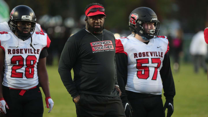 Roseville high school head coach Vernard Snowden talks to his team before action against Eastpointe on Friday, October 9, 2020.