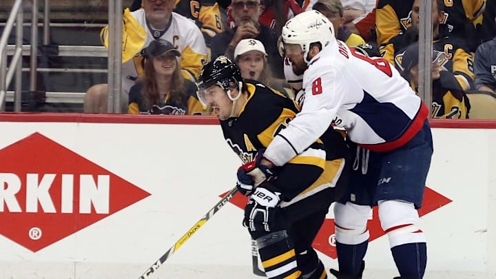 May 7, 2018; Pittsburgh, PA, USA; Pittsburgh Penguins center Evgeni Malkin (71) moves the puck against pressure from Washington Capitals left wing Alex Ovechkin (8) during the second period in game six of the second round of the 2018 Stanley Cup Playoffs at PPG PAINTS Arena. The Capitals won 2-1 in overtime to win the series 4 games to 2. Mandatory Credit: Charles LeClaire-Imagn Images