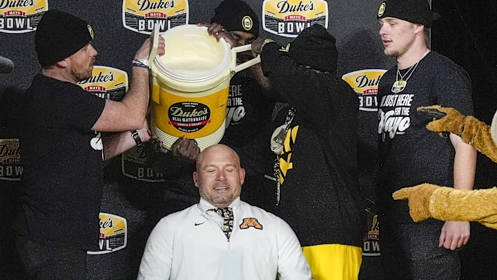 Jan 3, 2025; Charlotte, NC, USA; Minnesota Golden Gophers head coach P.J. Fleck prepares for the mayo dump after his teams’ win over Virginia Tech Hokies at the Duke’s Mayo Bowl at Bank of America Stadium. Mandatory Credit: Jim Dedmon-Imagn Images Jan 3, 2025; Charlotte, NC, USA; Minnesota Golden Gophers head coach P.J. Fleck prepares for the mayo dump after his teams’ win over Virginia Tech Hokies at the Duke’s Mayo Bowl at Bank of America Stadium. Mandatory Credit: Jim Dedmon-Imagn Images