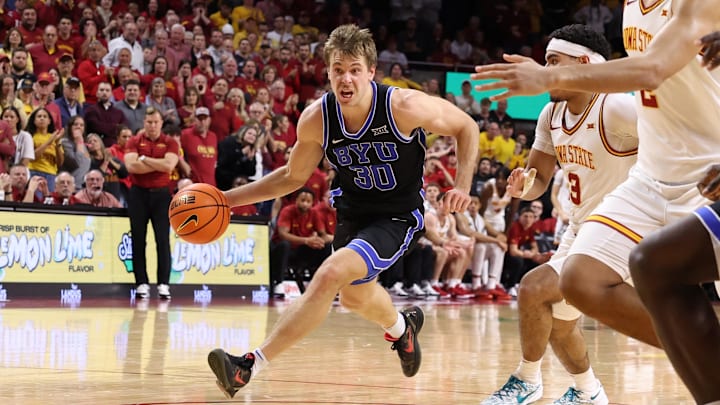 Mar 4, 2025; Ames, Iowa, USA; Brigham Young Cougars guard Dallin Hall (30) beats Iowa State Cyclones guard Tamin Lipsey (3) to the basket during the second half at James H. Hilton Coliseum. Mandatory Credit: Reese Strickland-Imagn Images Mar 4, 2025; Ames, Iowa, USA; Brigham Young Cougars guard Dallin Hall (30) beats Iowa State Cyclones guard Tamin Lipsey (3) to the basket during the second half at James H. Hilton Coliseum. Mandatory Credit: Reese Strickland-Imagn Images