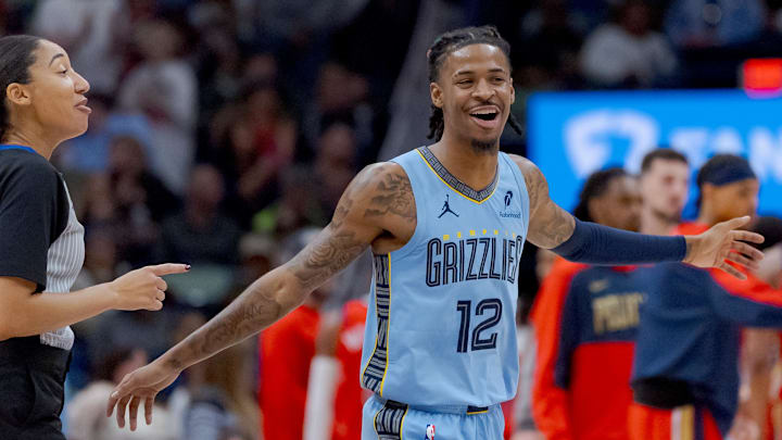 Dec 27, 2024; New Orleans, Louisiana, USA;  Memphis Grizzlies guard Ja Morant (12) reacts at halftime against the Memphis Grizzlies at Smoothie King Center. Mandatory Credit: Matthew Hinton-Imagn Images