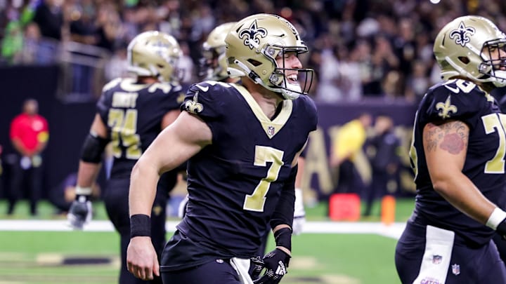 Oct 9, 2022; New Orleans, Louisiana, USA; New Orleans Saints tight end Taysom Hill (7) celebrates a touchdown with tight end Adam Trautman (82) against the Seattle Seahawks during the second half at Caesars Superdome. Mandatory Credit: Stephen Lew-Imagn Images