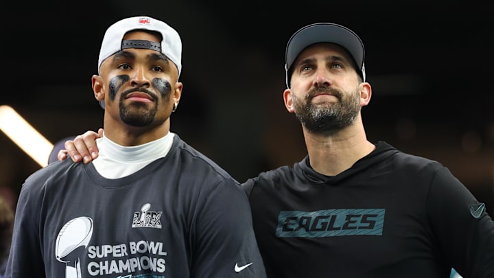 Feb 9, 2025; New Orleans, LA, USA; Philadelphia Eagles head coach Nick Sirianni and Philadelphia Eagles quarterback Jalen Hurts (1) on the podium after defeating the Kansas City Chiefs in Super Bowl LIX at Ceasars Superdome. Mandatory Credit: Mark J. Rebilas-Imagn Images