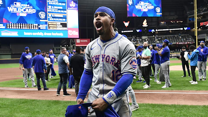 Oct 3, 2024; Milwaukee, Wisconsin, USA; New York Mets shortstop Francisco Lindor (12) celebrates after defeating the Milwaukee Brewers in game three of the Wildcard round for the 2024 MLB Playoffs at American Family Field. 