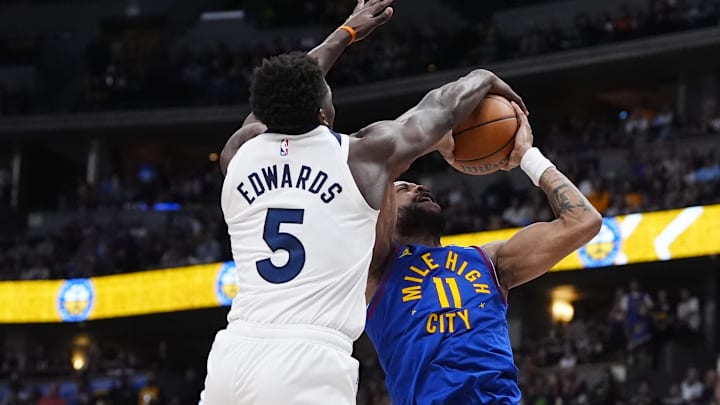 Mar 1, 2026; Denver, Colorado, USA; Minnesota Timberwolves guard Anthony Edwards (5) blocks the shot by Denver Nuggets guard Bruce Brown (11) in the second half at Ball Arena. Mandatory Credit: Ron Chenoy-Imagn Images Mar 1, 2026; Denver, Colorado, USA; Minnesota Timberwolves guard Anthony Edwards (5) blocks the shot by Denver Nuggets guard Bruce Brown (11) in the second half at Ball Arena. Mandatory Credit: Ron Chenoy-Imagn Images