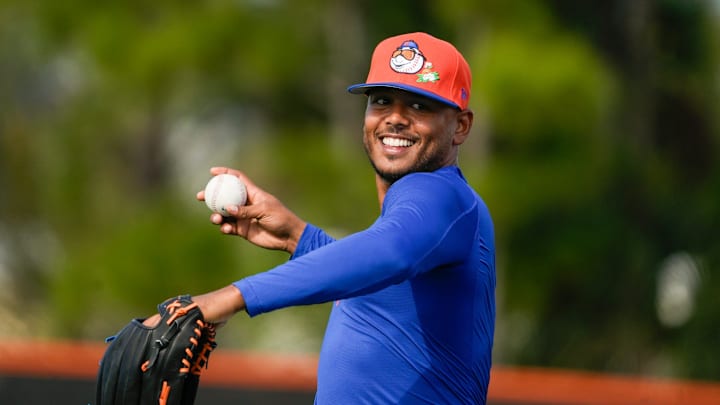 The New York Mets starting pitcher Freddy Peralta throws during spring training on the back fields of Clover Park on Feb. 11, 2026, in Port St. Lucie. The New York Mets starting pitcher Freddy Peralta throws during spring training on the back fields of Clover Park on Feb. 11, 2026, in Port St. Lucie.