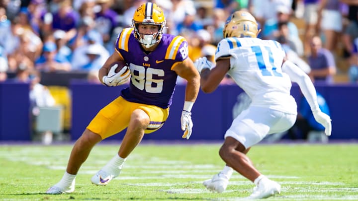 Tigers tight end Mason Taylor 86 runs the ball after the catch as the LSU Tigers take on UCLA at Tiger Stadium in Baton Rouge, LA. Saturday, Sept. 21, 2024.
