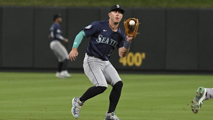 Seattle Mariners second baseman Dylan Moore catches a line drive during a game against the St. Louis Cardinals on Sept. 6 at Busch Stadium.