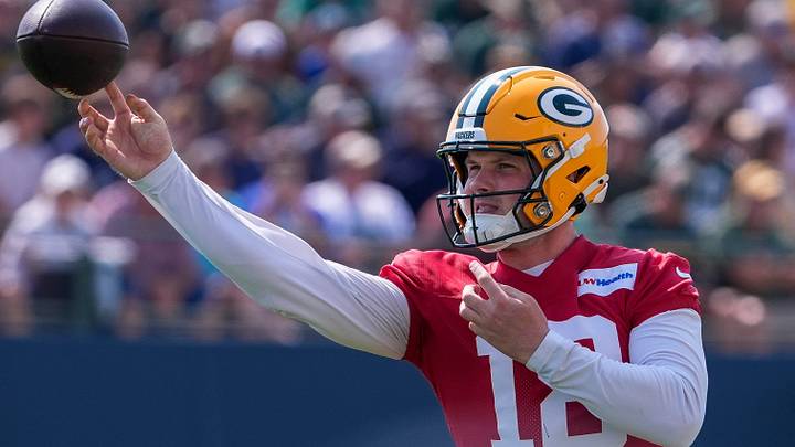Green Bay Packers quarterback Kyle McCord (18) passes the ball during the second day of training camp.