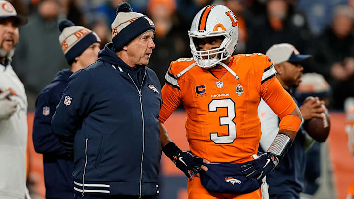 Dec 24, 2023; Denver, Colorado, USA; Denver Broncos head coach Sean Payton talks with quarterback