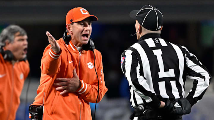 Dec 7, 2024; Charlotte, NC, USA; Clemson Tigers head coach Dabo Swinney talks to an official during the third quarter against the Southern Methodist Mustangs in the 2024 ACC Championship game at Bank of America Stadium. Dec 7, 2024; Charlotte, NC, USA; Clemson Tigers head coach Dabo Swinney talks to an official during the third quarter against the Southern Methodist Mustangs in the 2024 ACC Championship game at Bank of America Stadium.