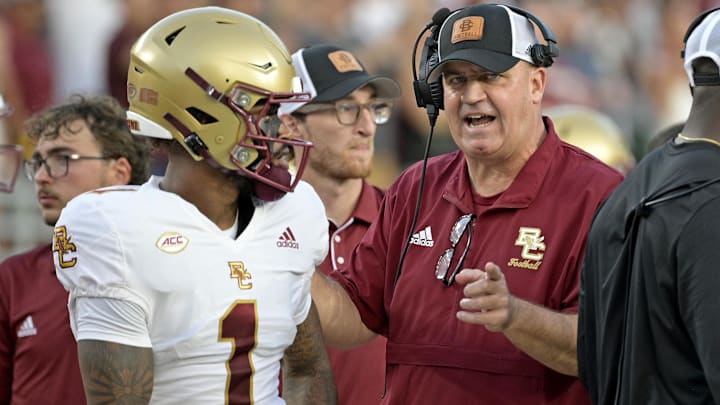 Sep 2, 2024; Tallahassee, Florida, USA; Boston College Eagles quarterback Thomas Castellanos (1) speaks with head coach Bill O'Brien before the game against the Florida State Seminoles at Doak S. Campbell Stadium. Mandatory Credit: Melina Myers-Imagn Images Sep 2, 2024; Tallahassee, Florida, USA; Boston College Eagles quarterback Thomas Castellanos (1) speaks with head coach Bill O'Brien before the game against the Florida State Seminoles at Doak S. Campbell Stadium. Mandatory Credit: Melina Myers-Imagn Images