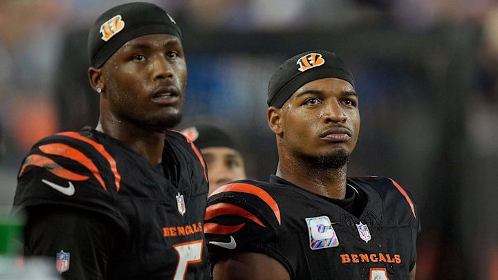 Cincinnati Bengals wide receiver Tee Higgins (5) and wide receiver Ja'Marr Chase (1) watch the score board as their team lose to the Detroit Lions 24-37 at Paycor Stadium on October 5, 2025. Cincinnati Bengals wide receiver Tee Higgins (5) and wide receiver Ja'Marr Chase (1) watch the score board as their team lose to the Detroit Lions 24-37 at Paycor Stadium on October 5, 2025.