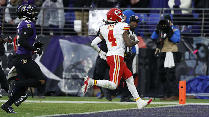 Jan 28, 2024; Baltimore, Maryland, USA; Kansas City Chiefs wide receiver Rashee Rice (4) scores a touchdown against the Baltimore Ravens during the first half in the AFC Championship football game at M&T Bank Stadium. Mandatory Credit: Geoff Burke-Imagn Images