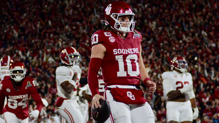 Oklahoma quarterback John Mateer celebrates after a touchdown against Alabama in the CFP. Oklahoma quarterback John Mateer celebrates after a touchdown against Alabama in the CFP.
