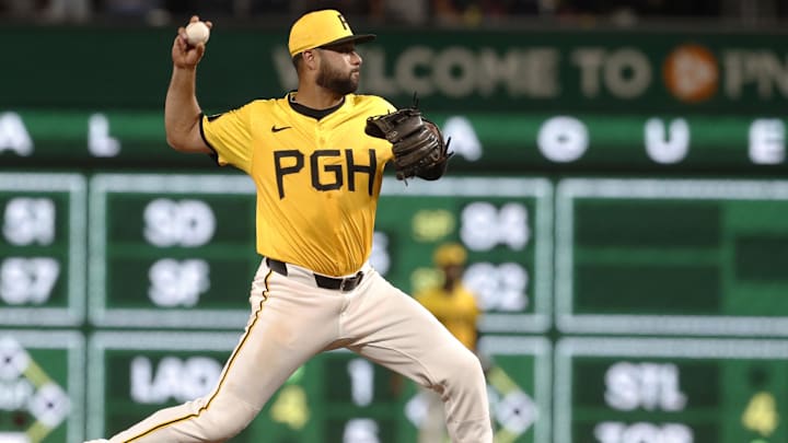 Pittsburgh Pirates shortstop Isiah Kiner-Falefa (7) throws to first base after a force out at second base against the Kansas City Royals during the sixth inning at PNC Park. 