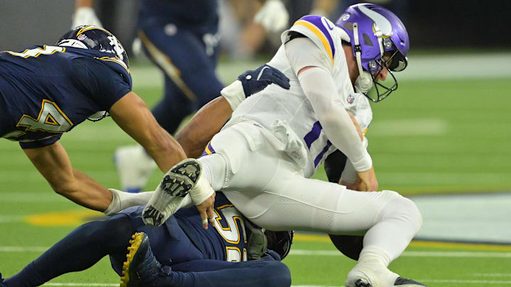 Oct 23, 2025; Inglewood, California, USA; Los Angeles Chargers linebacker Khalil Mack (52) sacks Minnesota Vikings quarterback Carson Wentz (11) during the second half at SoFi Stadium. Oct 23, 2025; Inglewood, California, USA; Los Angeles Chargers linebacker Khalil Mack (52) sacks Minnesota Vikings quarterback Carson Wentz (11) during the second half at SoFi Stadium.
