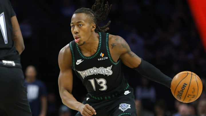 Feb 8, 2026; Minneapolis, Minnesota, USA; Minnesota Timberwolves guard Ayo Dosunmu (13) brings the ball up court against the Los Angeles Clippers in the first quarter at Target Center. Mandatory Credit: Bruce Kluckhohn-Imagn Images