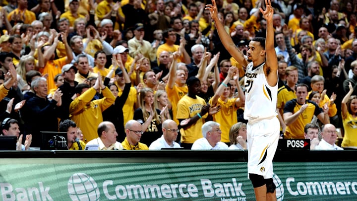 Mar 5, 2013; Columbia, MO, USA; Missouri Tigers forward Laurence Bowers (21) salutes the crowd as he goes to the bench during the second half at Mizzou Arena. The Missouri Tigers defeated the Arkansas Razorbacks 93-63. Mandatory Credit: Dak Dillon-Imagn Images
