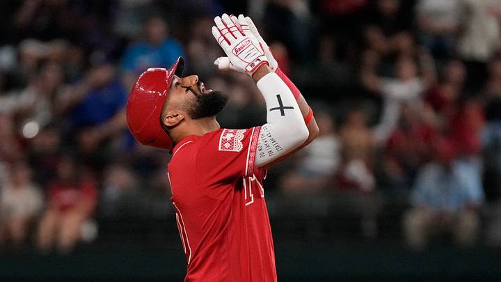 Aug 21, 2026; Arlington, Texas, USA;  Texas Rangers shortstop Ezequiel Duran (20) reacts after hitting a double against the Los Angeles Angels during the ninth inning at Globe Life Field. Mandatory Credit: Raymond Carlin III-Imagn Images