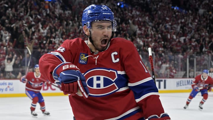 Apr 25, 2025; Montreal, Quebec, CAN; Montreal Canadiens forward Nick Suzuki (14) celebrates after scoring a goal against the Washington Capitals during the second period in game three of the first round of the 2025 Stanley Cup Playoffs at the Bell Centre. Mandatory Credit: Eric Bolte-Imagn Images Apr 25, 2025; Montreal, Quebec, CAN; Montreal Canadiens forward Nick Suzuki (14) celebrates after scoring a goal against the Washington Capitals during the second period in game three of the first round of the 2025 Stanley Cup Playoffs at the Bell Centre. Mandatory Credit: Eric Bolte-Imagn Images