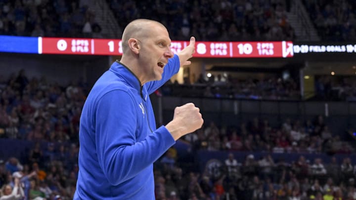 Mar 14, 2025; Nashville, TN, USA;  Kentucky Wildcats head coach Mark Pope screams to his team against the Alabama Crimson Tideduring the first half at Bridgestone Arena. Mandatory Credit: Steve Roberts-Imagn Images