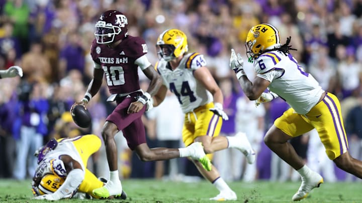 Oct 25, 2025; Baton Rouge, Louisiana, USA; Texas A&M Aggies quarterback Marcel Reed (10) runs for a touchdown during the first half against the Louisiana State Tigers at Tiger Stadium. Mandatory Credit: Stephen Lew-Imagn Images Oct 25, 2025; Baton Rouge, Louisiana, USA; Texas A&M Aggies quarterback Marcel Reed (10) runs for a touchdown during the first half against the Louisiana State Tigers at Tiger Stadium. Mandatory Credit: Stephen Lew-Imagn Images