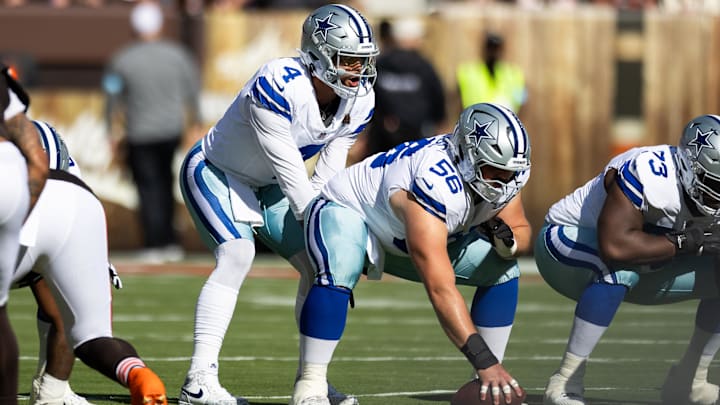 Dallas Cowboys quarterback Dak Prescott (4) lines up behind center Cooper Beebe (56) Dallas Cowboys quarterback Dak Prescott (4) lines up behind center Cooper Beebe (56)