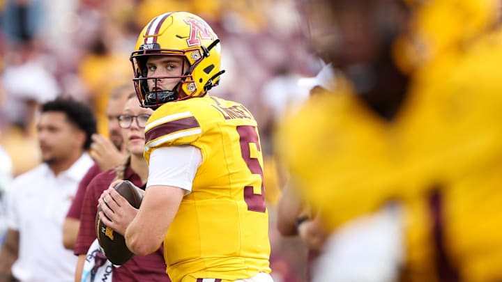 Aug 28, 2025; Minneapolis, Minnesota, USA; Minnesota Golden Gophers quarterback Drake Lindsey (5) warms up before the game against the Buffalo Bulls at Huntington Bank Stadium. Mandatory Credit: Matt Krohn-Imagn Images