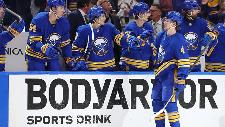 Apr 21, 2026; Buffalo, New York, USA; Buffalo Sabres defenseman Bowen Byram (4) celebrates his goal with teammates during the third period against the Boston Bruins in game two of the first round of the 2026 Stanley Cup Playoffs at KeyBank Center. Mandatory Credit: Timothy T. Ludwig-Imagn Images