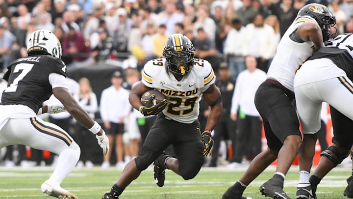 Oct 25, 2025; Nashville, Tennessee, USA;  Missouri Tigers running back Ahmad Hardy (29) runs with the ball against the Vanderbilt Commodores during the second half at FirstBank Stadium. Mandatory Credit: Steve Roberts-Imagn Images